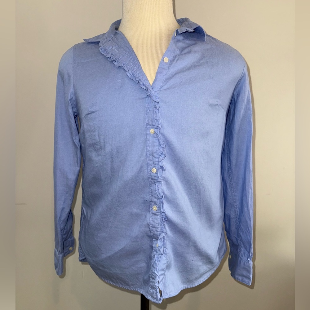 Blue long sleeved Banana Republic button-up shirt.